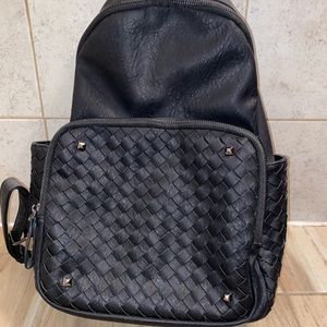 Madison west brand leather backpack.